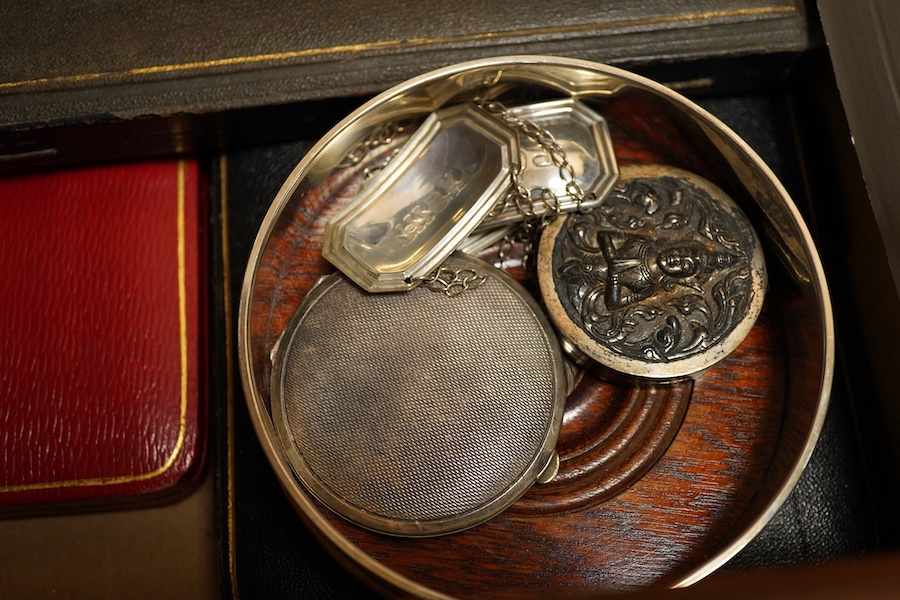 An Elizabeth II silver bottle coaster, London, 1997, M C Hersey & Son Ltd together with a cased set of six bright cut teaspoons, a cased set of pistol grip handled tea knives, a cased silver handled shoe horn and button